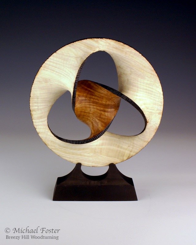 Inversion-   A minimal surface that joins a trefoil knot as the inner edge with a circle as the outer edge.----SOLD